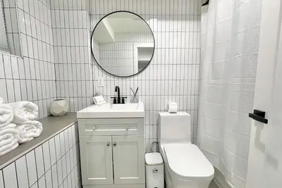 Image de Private Spacious 4beds\/Wd Townhouse mins to Nyc Center w\/ Wifi and Central Ac