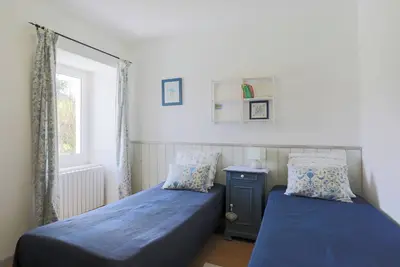 Image de Maison d'hôtes 'Chambre Jardin 1 Ou 2 Lits' avec terrasse partagée, jardin partagé et Wi-Fi