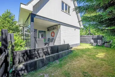 Image de Maison de bord de mer avec jardin