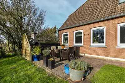 Image de Appartement \"Lehmhuus\" avec terrasse partagée, jardin partagé et Wi-Fi
