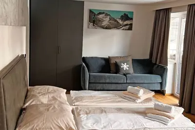 Image de Suite bis zu 4 P. & Wellnessbereich by Interhome