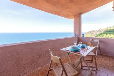 Image de Appartement 'Il Belvedere Di Achille' avec vue sur mer, terrasse privée et climatisation
