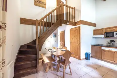 Image de Appartement 'Les Fermes De Samoëns' avec vue sur les montagnes, piscine partagée et balcon