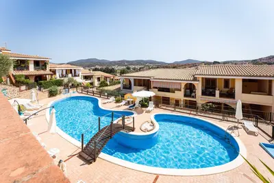 Image de Maison de vacances 'I Girasoli' avec piscine partagée, terrasse privée et jardin commun