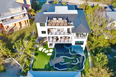 Image de Resort-Style Home with Lazy River Pool and Beach Views - Nautical Situation