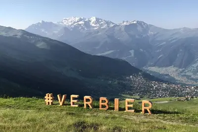 Soak the Alpine sun from your private balcony with views over Verbier