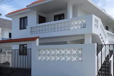 Image de White Paradise Beach House: Your Coastal Haven