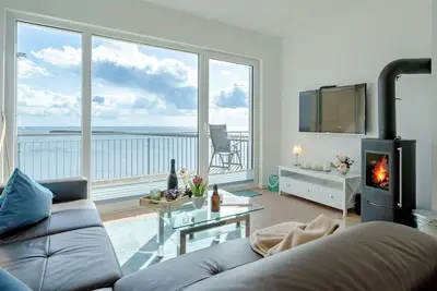 Image de Fewo Kleine Auszeit by Seeblick Ferien Oro, direkter Wasserblick, am Strand