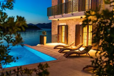 Image de Sea front Villa Draga with heated infinity pool