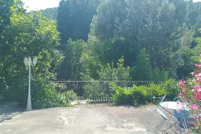 Image de Gîte rural avec terrasse et piscine près de la rivière