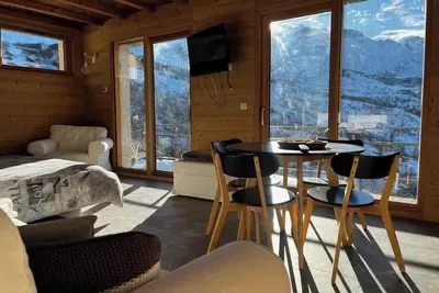 Image de Appartement 'Grand Aigle - Albiez Montrond' avec vue sur la montagne, terrasse privée et Wi-Fi