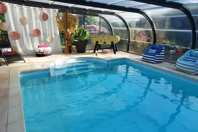Image de maison avec piscine couverte et chauffée et pergola bioclimatique de 30m²