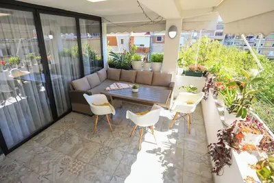 Image de Colorful Oasis with Sunny Balcony
