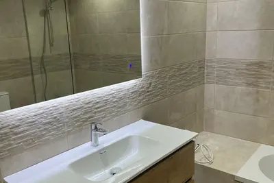 Image de Large 3 Br Duplex, 3 Bathrooms, Pool, beach, Free WiFi, Views, Golf, Parking.