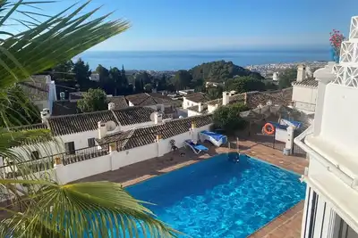 Image de Appartement 'Paradise In Mijas Pueblo' avec vue sur la mer, piscine partagée et climatisation