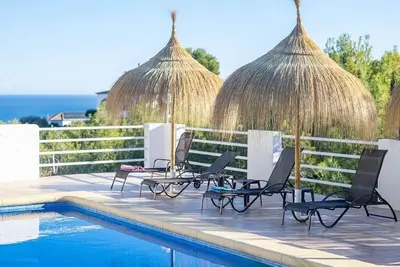 Image de Maison de vacances 'Ferienhaus Deluxe Villa Vistamar' avec vue sur la mer, Wi-Fi et climatisation