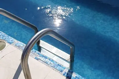 Image de S. Close to the beach, 2 blocks to market, 2 bedroom, free wifi, roof top pool