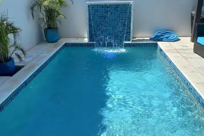 Image de Ocean Breeze 2-bedroom 2-Bath in Nassau w/ Pool, Ac, WiFi, Barbecue.