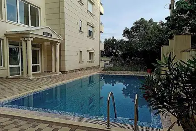 Image de Greenhill-wohnung in Einem Neubau. Grüne Ruhezone. 900 Meter zum Meer