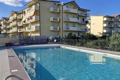 Image de Spacious 2-Bed Apt in Calabria-with pool and Ac, and 5 minutes walk to the beach