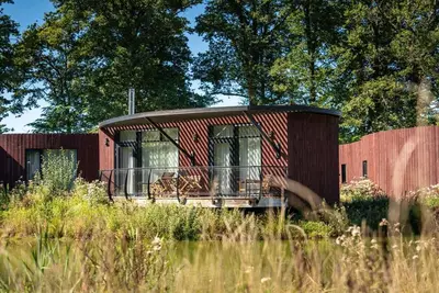 Image de Bungalow moderne en feuilles! par Belvilla