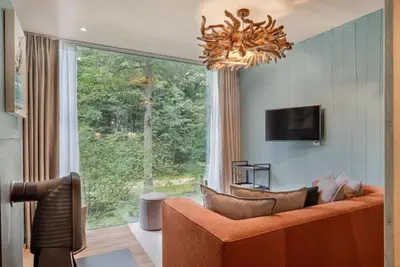 Image de Loft dans les arbres avec sauna de Belvilla