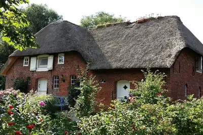 Image de Appartement \"Haus Am Alten Deich\" avec terrasse privée, jardin partagé et Wi-Fi