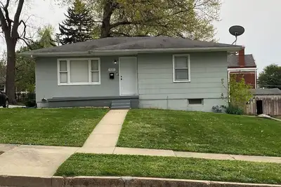 Charming 2-bedroom house in Atchison on quiet brick and tree lined street.