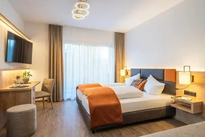 Image de Suite Seeglück for 5 persons half board - Ferienhotel Trattnig