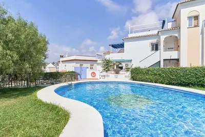 Image de Maison de vacances 'Playa Burriana Nerja' avec piscine partagée, terrasse privée et Wi-Fi