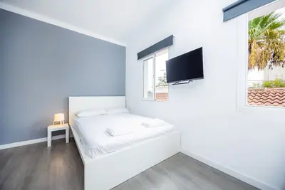 Image de Chambre double Nº7' avec terrasse partagée, Wi-Fi et climatisation