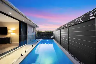 Image de Immerse in the ultimate family getaway at our Burleigh Heads haven, where comfort meets charm!