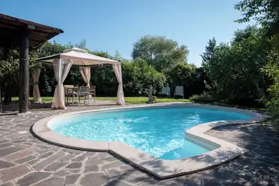 Image de Casa Schatz is a spacious cottage with a large furnished garden and swimming pool.