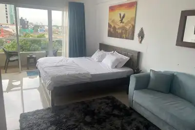A Studio apartment with A\/C, Free WiFI&Roof top Pool with a scenic view of ocean