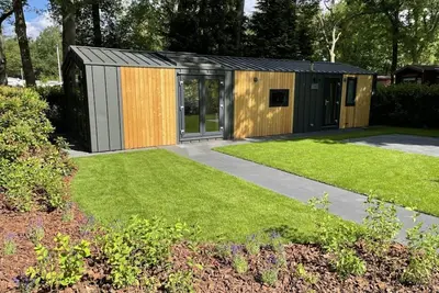 Image de Enjoy a relaxing holiday in a modern Cozy Chalet in the most beautiful location in the Veluwe.