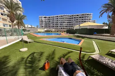 Image de Appartement de vacances 'Mirador Los Molinos' avec vue sur la mer, piscine partagée et jardin