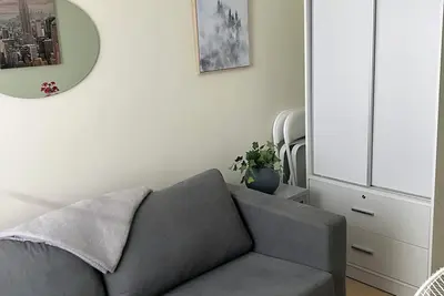 Cozy condo with Ac and fitness room in lovely Dumaguete steps from the Ocean