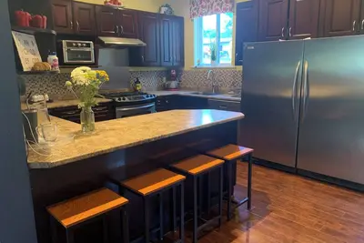 Image de 4 Bedroom Spacious Home close to Everything!