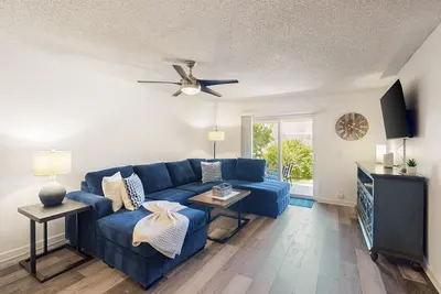 Modern remodeled condo with two patios, pool, and fast internet