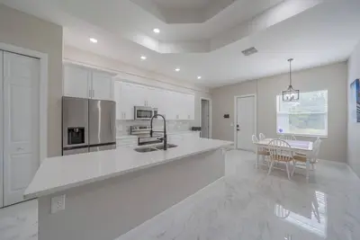Image de Charming 4-bedroom New Construction farmhouse in pleasant Lehigh Acres