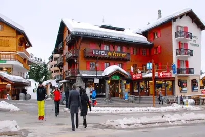 Top floor home with south facing balcony in the arms of Verbier