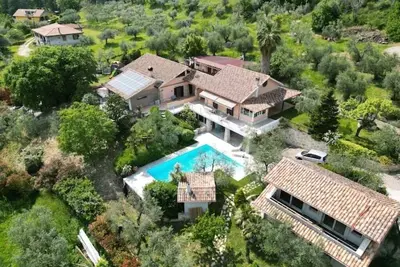 Sabina olive green vacation home with padel court and pool
