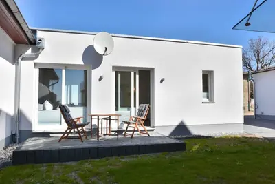 Image de Ferienhaus Kuschelnest - Wonderful vacation apartment with lagoon view and terrace