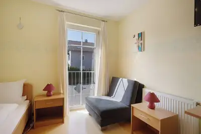 Image de Chambre 'Zimmer 8 - Zweibettzimmer' avec vue sur les montagnes, terrasse partagée et Wi-Fi