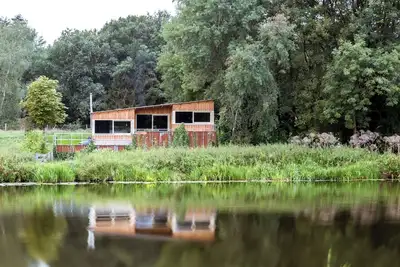 Cozy and luxurious nature cottage overlooking the river Vecht