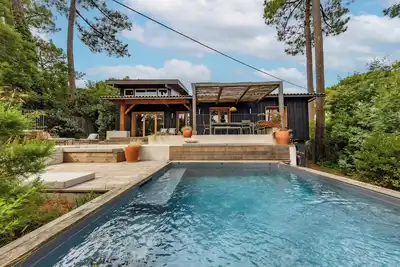 Image de Villa 'Cap-Ferret, Vue Bassin-pinède' avec terrasse partagée, jardin privé et Wi-Fi