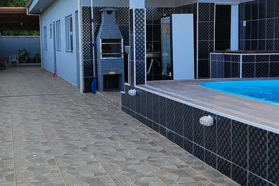 Image de Casa com Piscina em Itanhaém a 10 Minutos da Praia