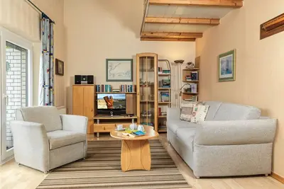 Image de This semi-detached holiday home is located on a plot of over 600m², fenced in wi