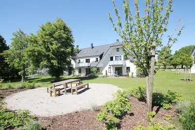 Image de Beachfront apartment with terrace, use of swimming pool and sauna - Rex Rugia apartment 12-2