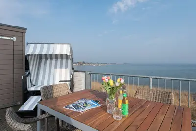 Image de Möwenblick - 1st row by the water, sauna, whirlpool, fireplace, balcony, parking space